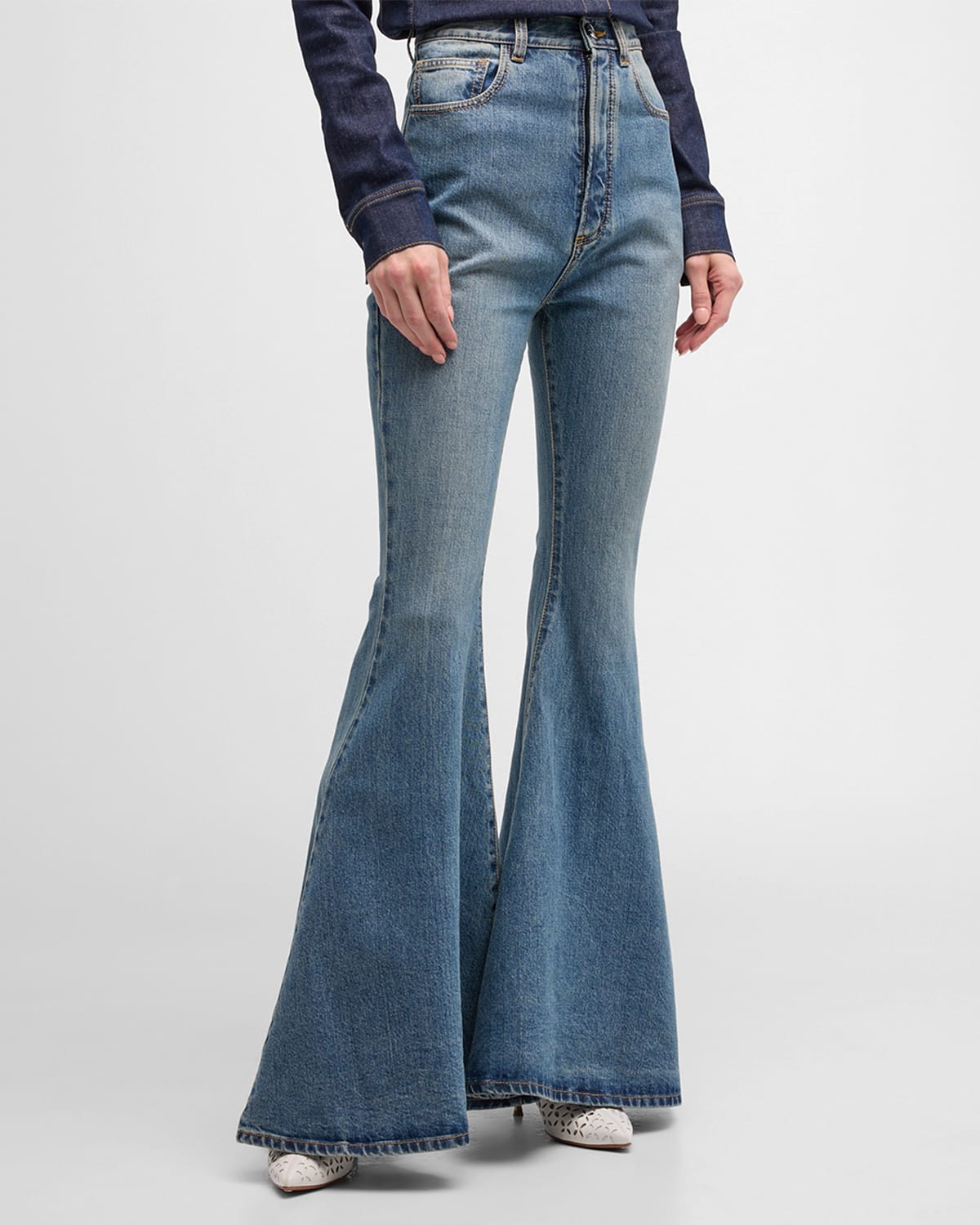 Shop Alaïa High-rise Flared Denim Pants In Bleu Vintage