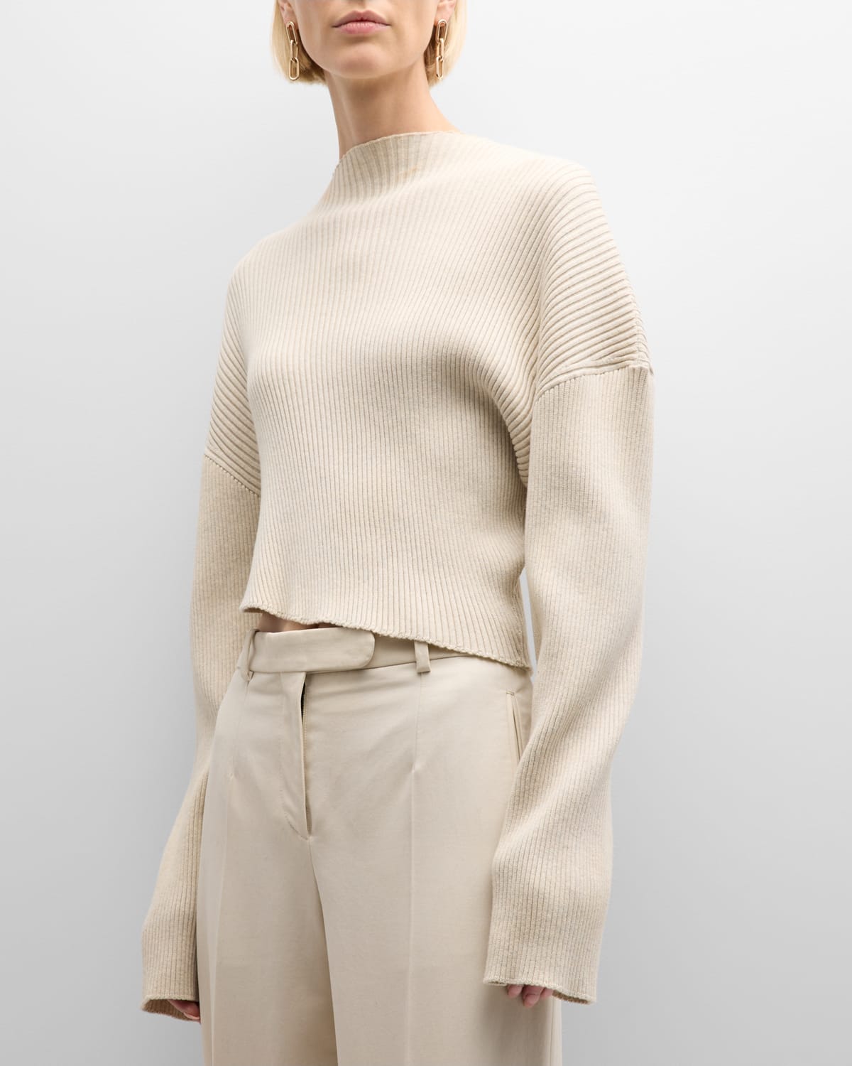 Asymetric sculptural rib knit sweater