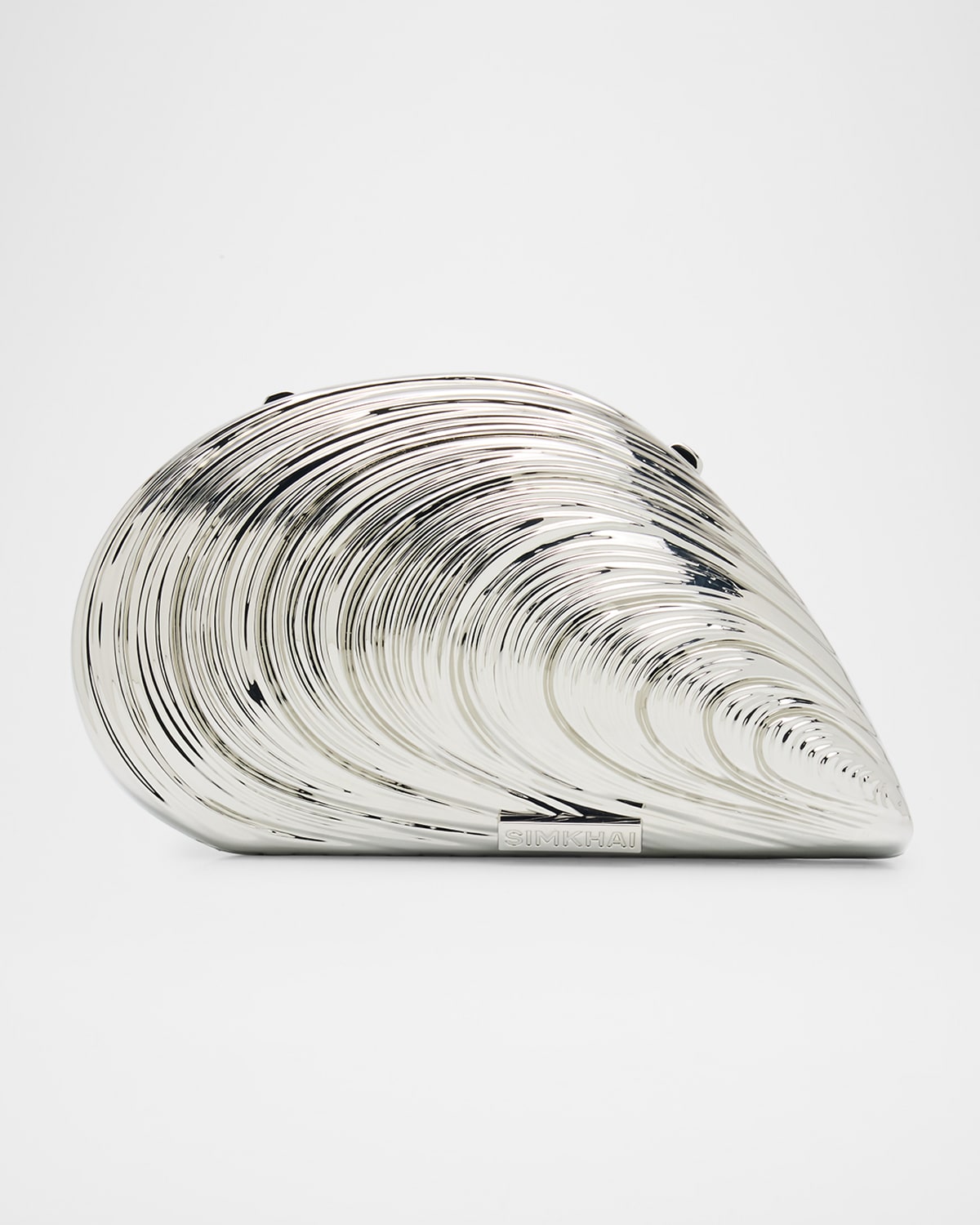 Simkhai Bridget Metal Oyster Shell Clutch Bag In Silver