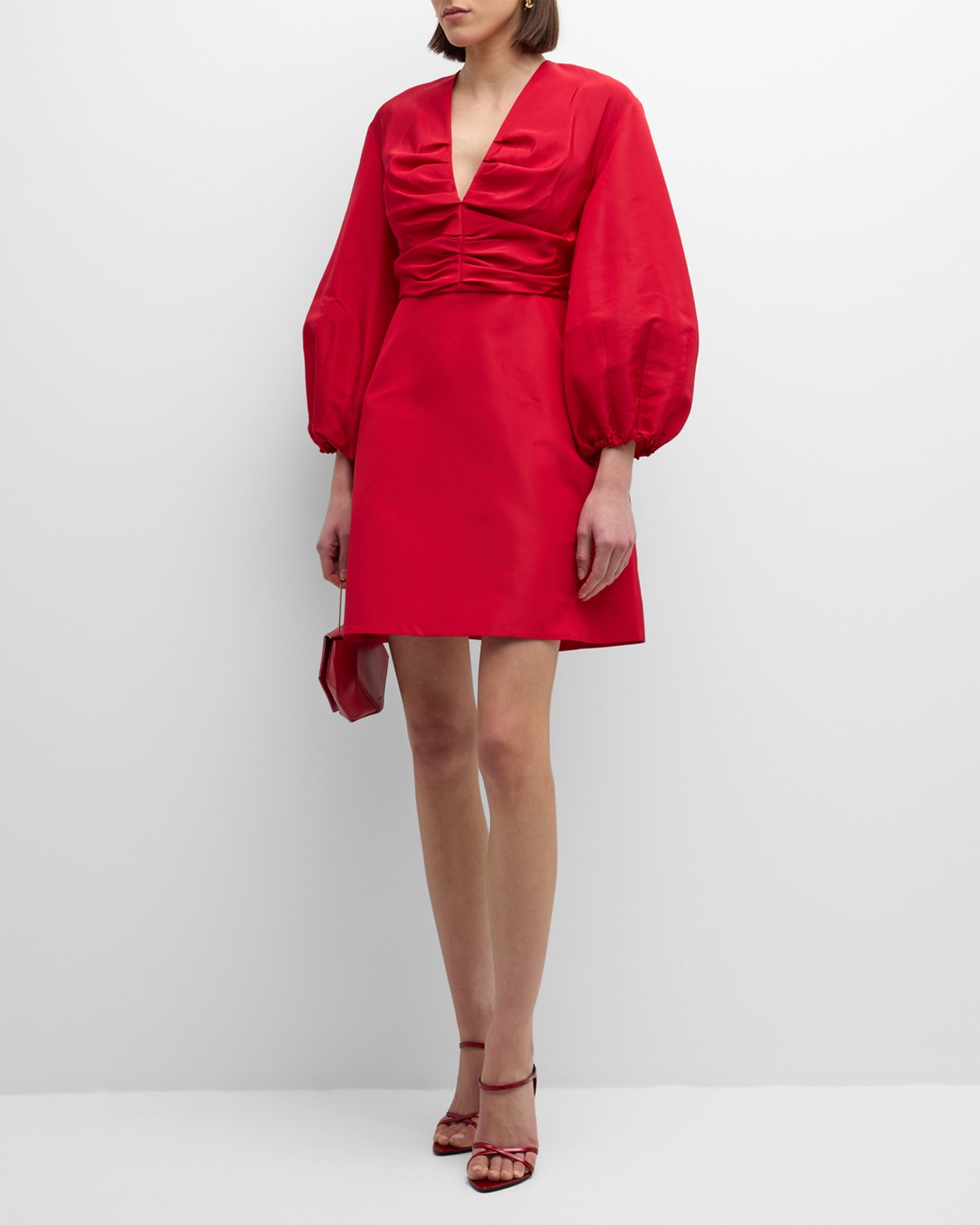 Shop Carolina Herrera Ruched Plunging Balloon-sleeve Mini Dress In Crimson