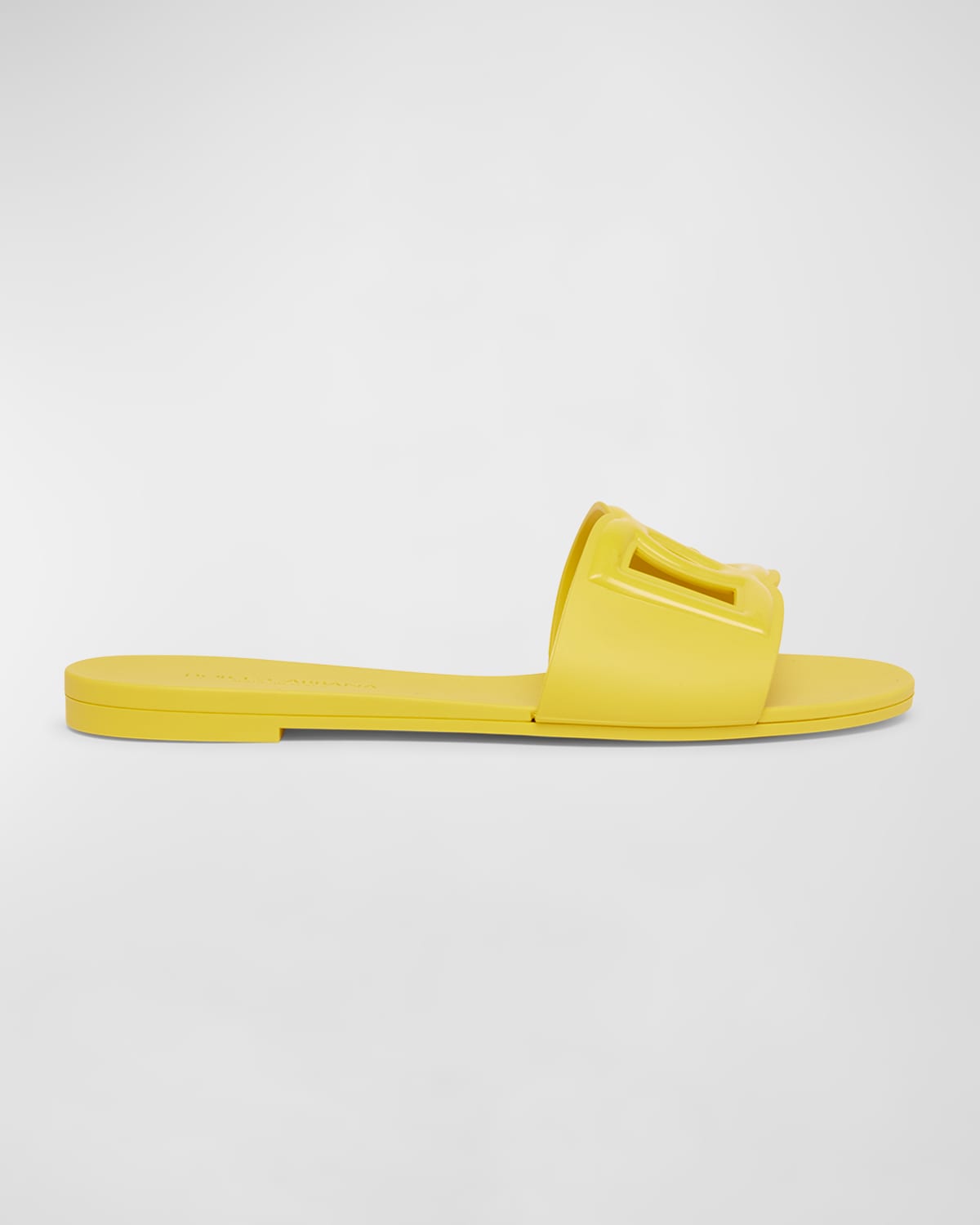 Shop Dolce & Gabbana Cut-out Dg Rubber Sandals In Yellow