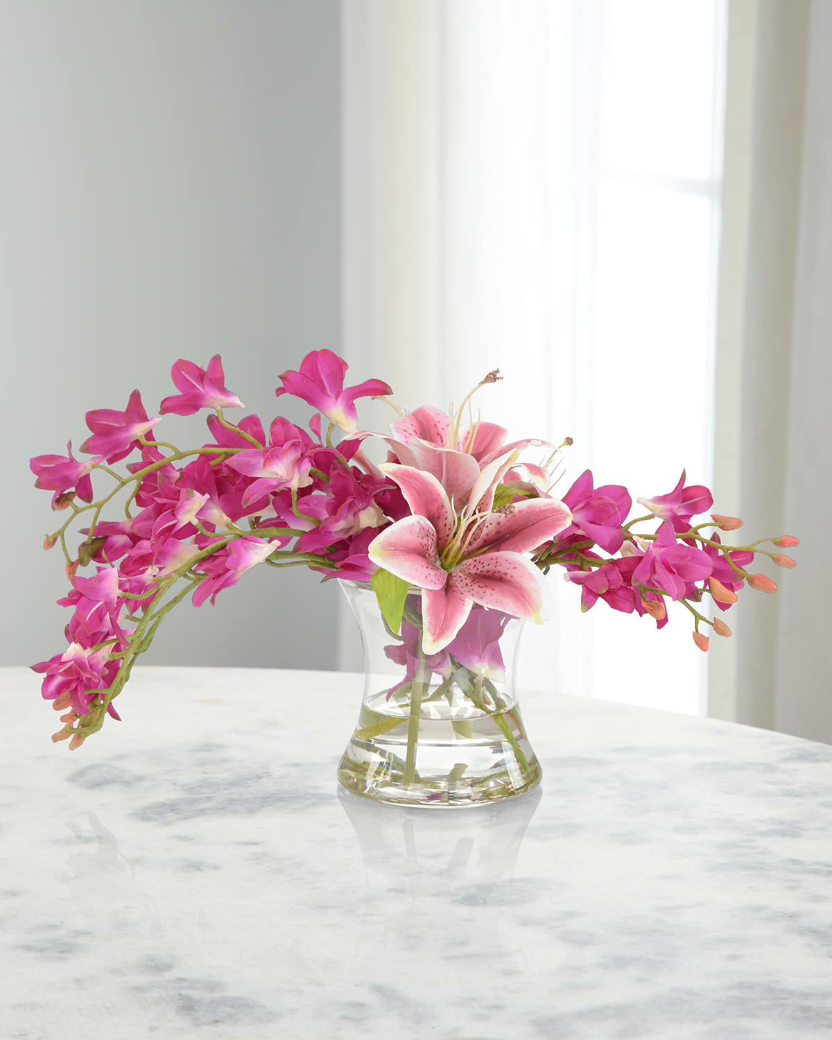 Shop John-richard Collection Hurricane Orchids 22" Faux Floral Arrangement In Glass Vase In Pink