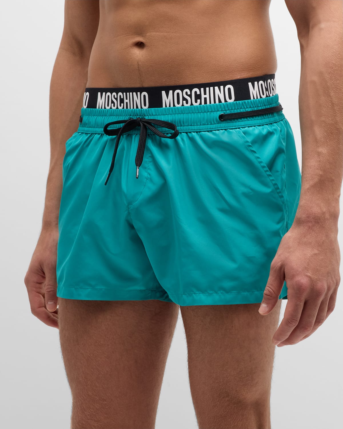 Shop Moschino Men's Contrast Logo Waistband Swim Shorts In Green