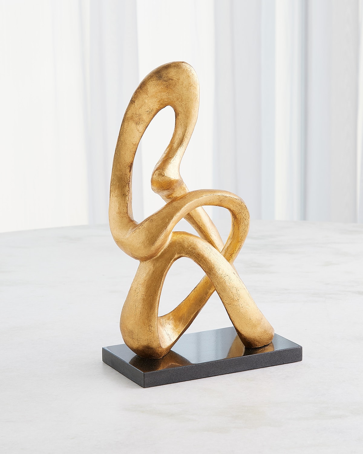 Shop Global Views Sitting Loop Sculpture In Gold