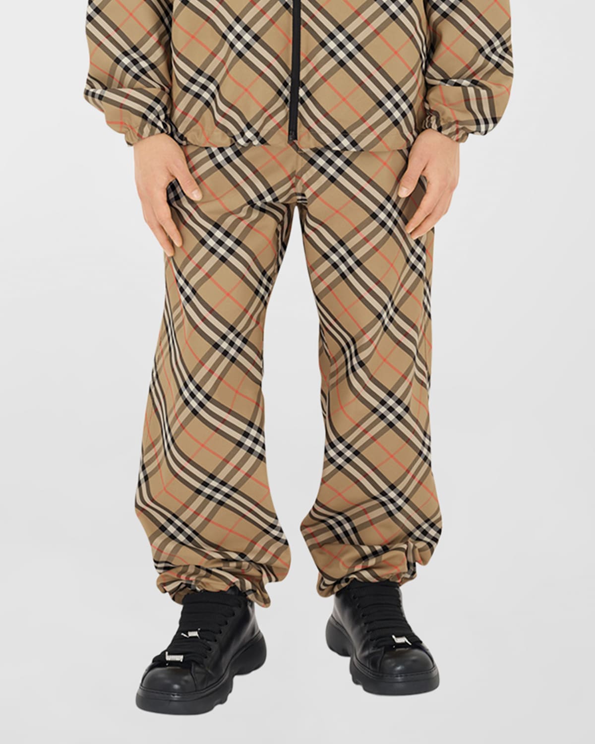 Shop Burberry Men's Pull-on Check Trousers In Sand Ip Check