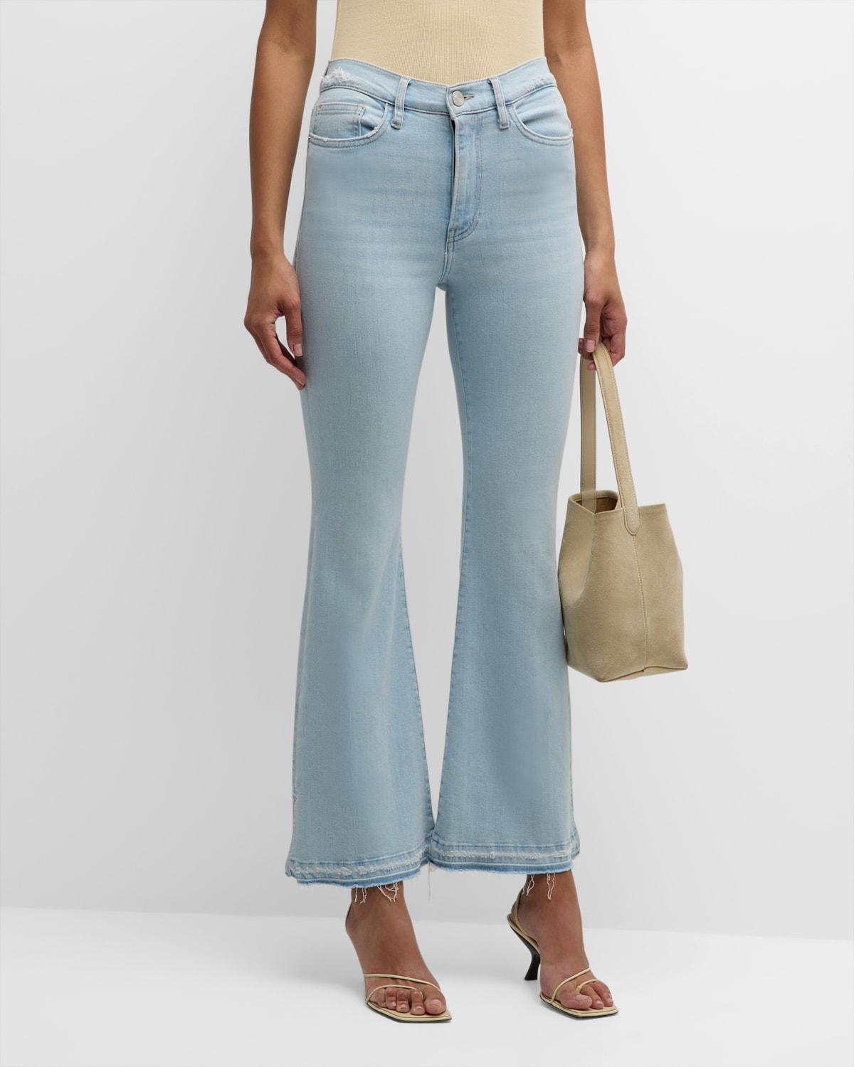Shop Frame Le Easy Flare Released Fray Side Slit Jeans In Clarity