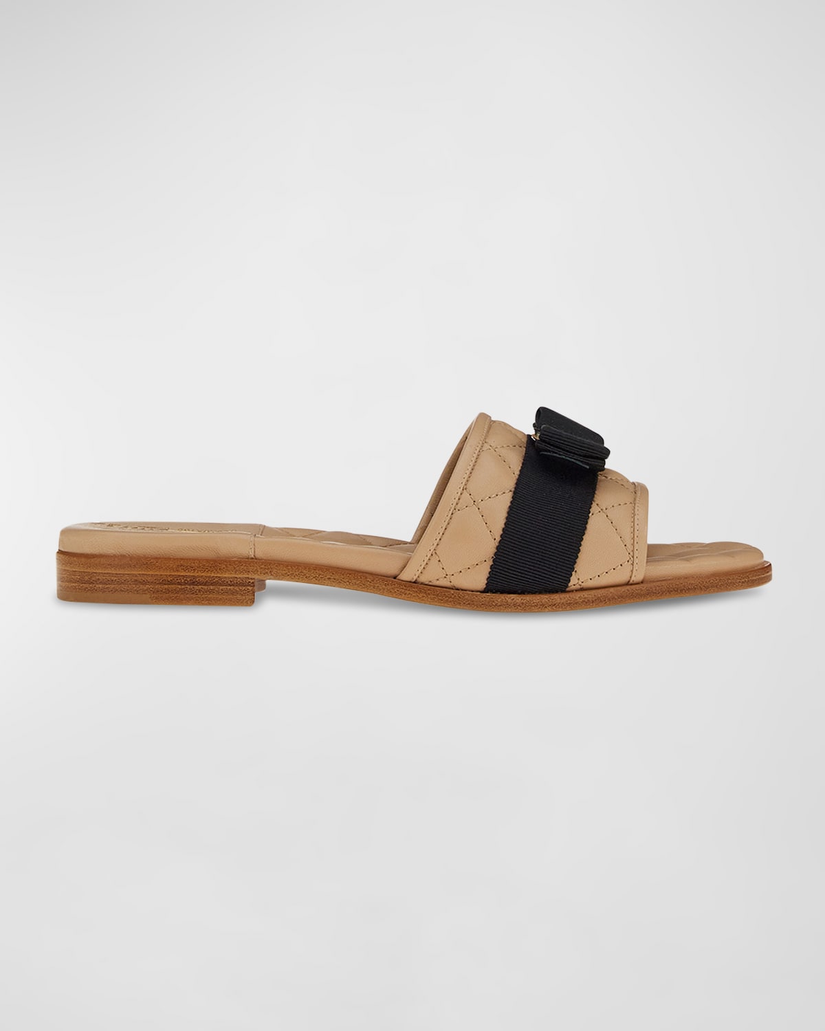 Shop Ferragamo Quilted Leather Bow Flat Slide Sandals In New Bisque