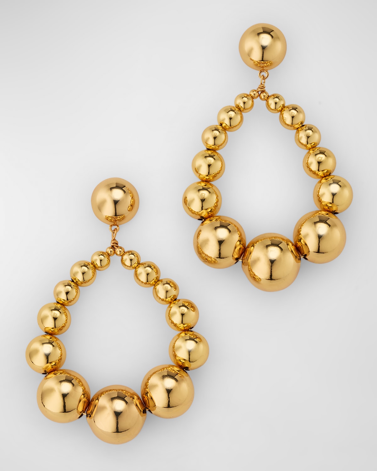 Kenneth Jay Lane Graduating Balls On Oval Drop Hoop Earrings In Gold