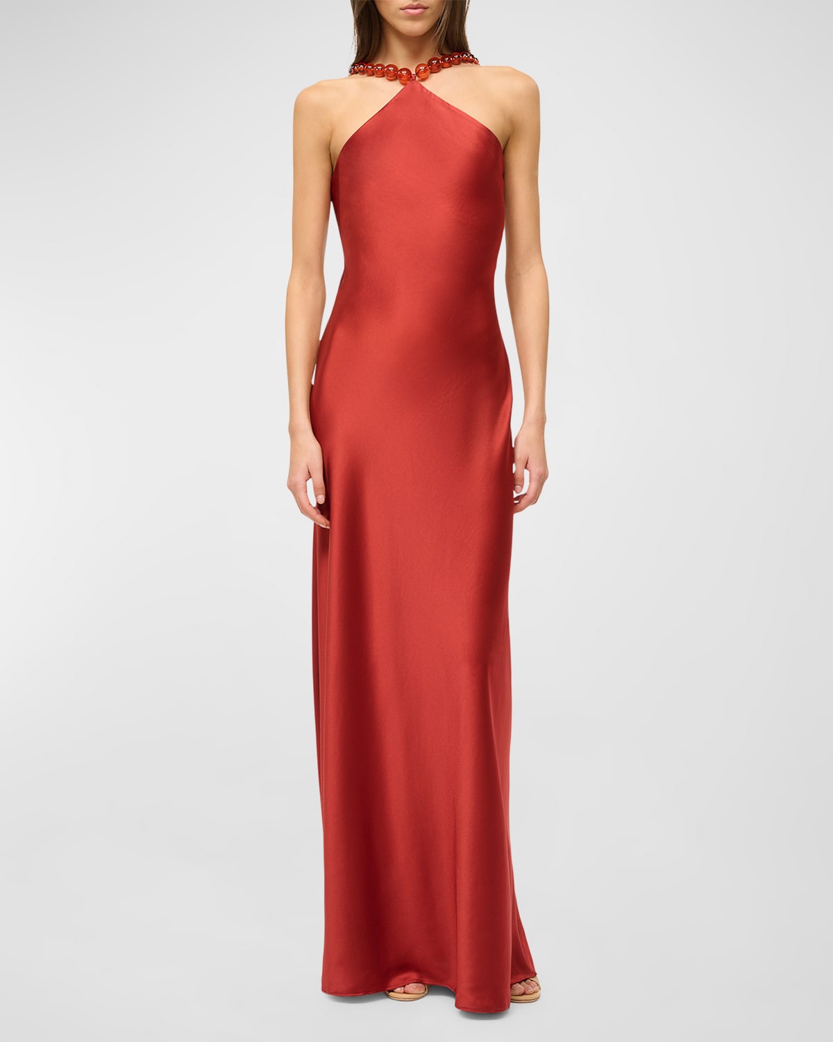 Shop Staud Cadence Beaded Halter Satin Maxi Dress In Rust