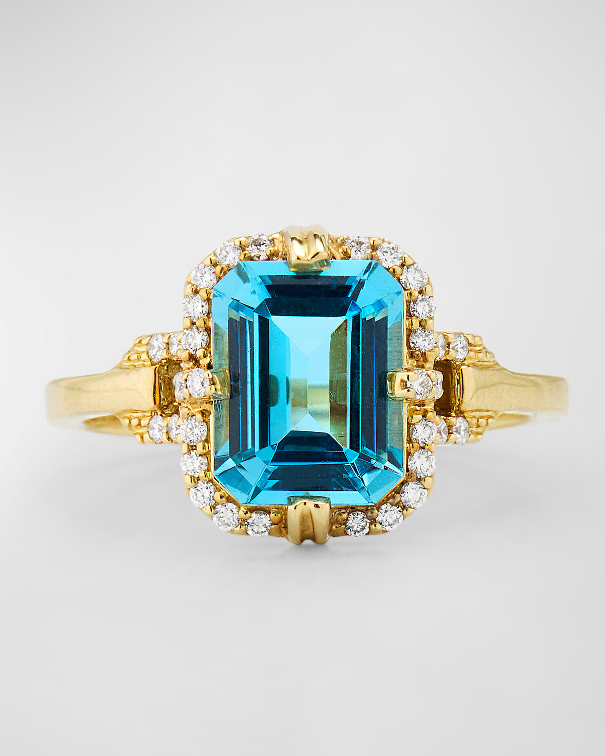 Gossip Emerald Cut Blue Topaz Ring in 18K Yellow Gold with Diamonds