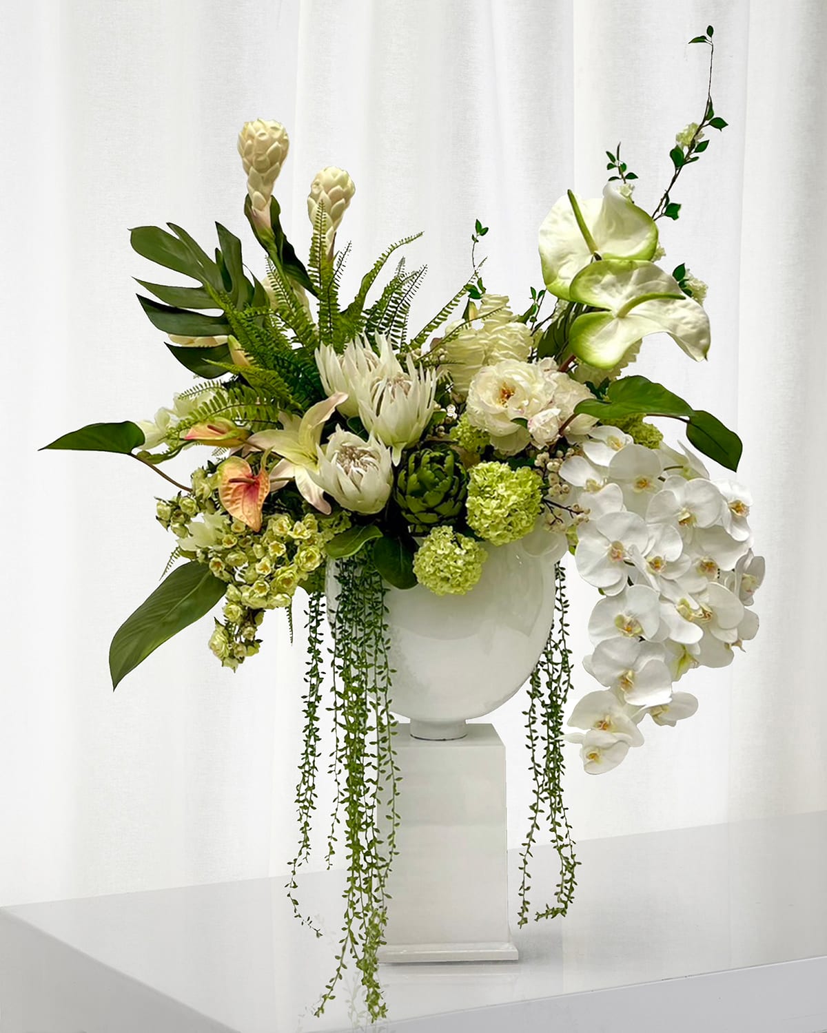 Winward Home Deluxe Tropical 52" Faux Floral Arrangement In Resin Pot With Stand In White/green