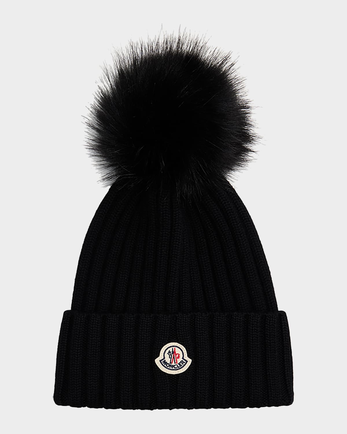 Moncler Ribbed Knit Wool Beanie With Faux Fur Pom-pom In Black