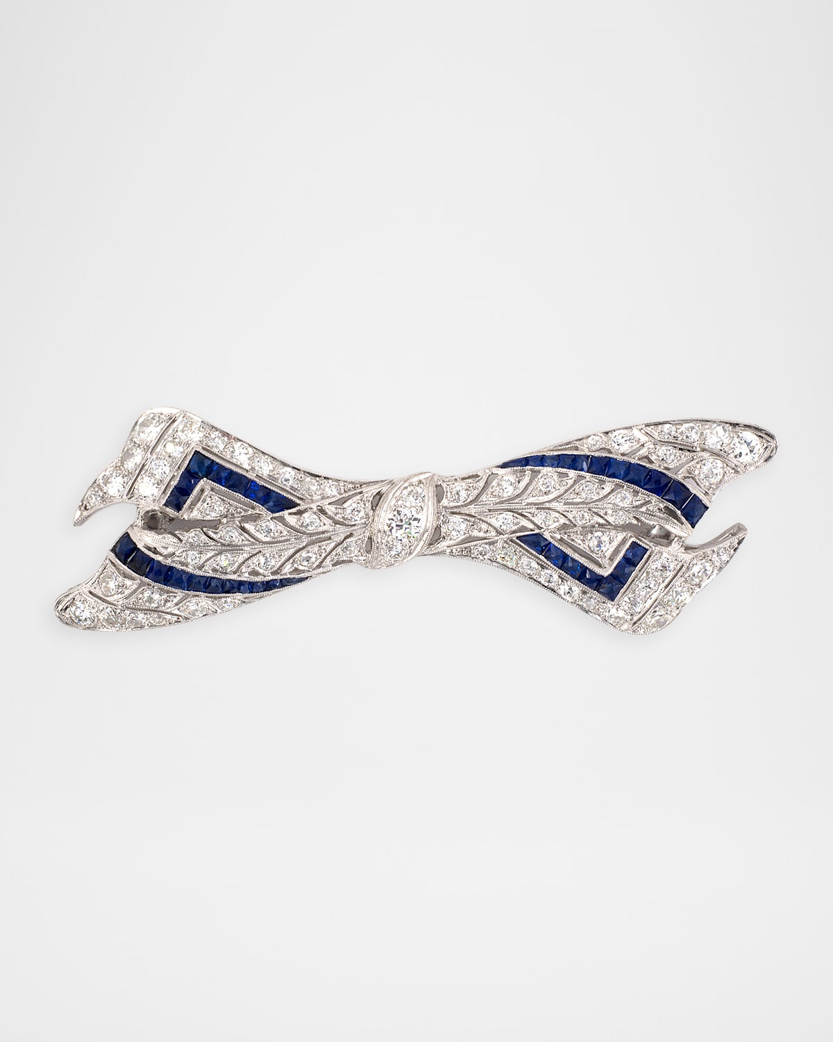NM Estate Estate Platinum Diamond and Sapphire Art Deco Bow Brooch