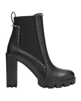 Lacquered women's black work boots with a red sole