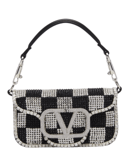 Valentino Garavani's Small Loco Bag features an embellished silk body  adorned with the brand's signature gold-tone oversized logo—woven…