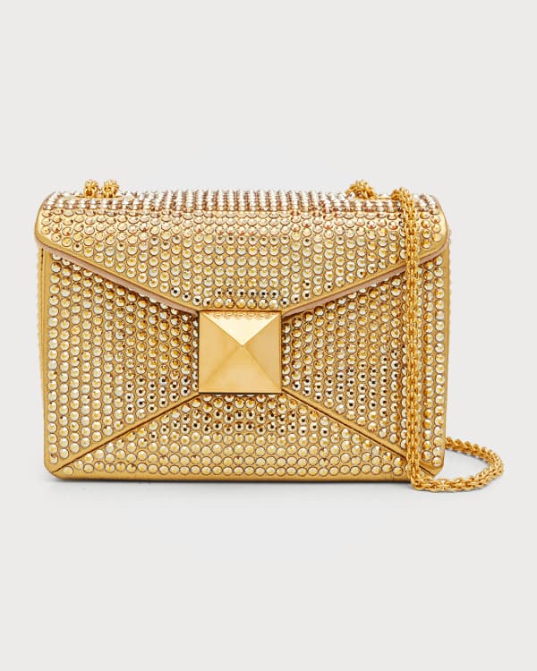 Roman Stud-embellished diamond-quilted clutch bag