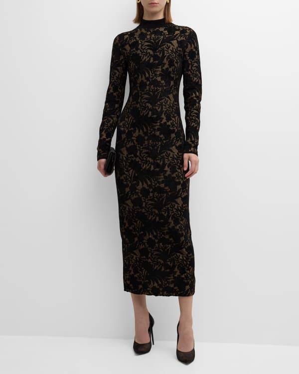 Alexander McQueen - A Sarabande lace dress worn with a black