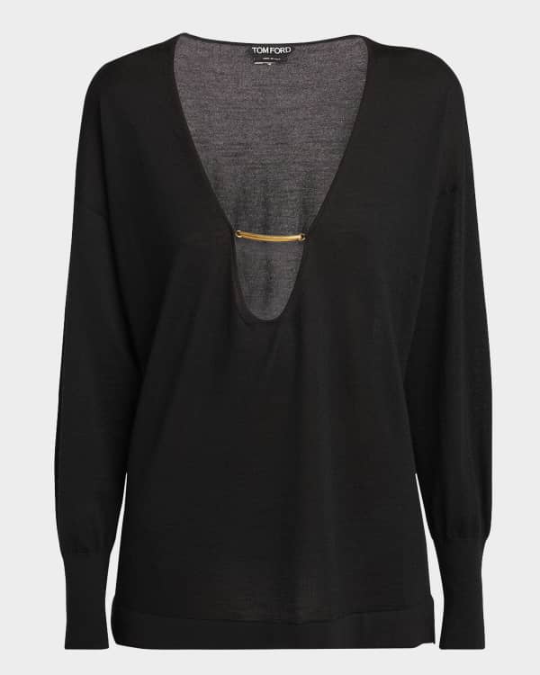 Long-sleeved V-neck sweater with a strapless top Long-sleeved V-neck sweater with a strapless top