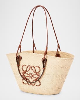 x Paula's Ibiza Anagram Basket Bag in Iraca Palm with Leather Handles
