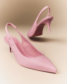 Sporty Kate Red Sole Slingback Pumps