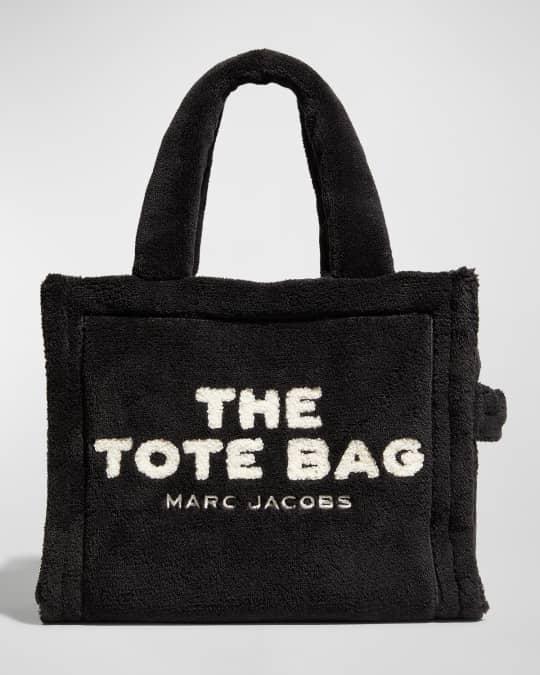 What do you guys use this strap/handle for???? Marc Jacobs Tote