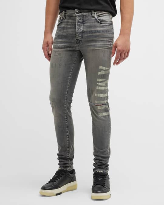 Amiri Men's Faded Skinny Jeans with Staggered Logo - Bergdorf Goodman