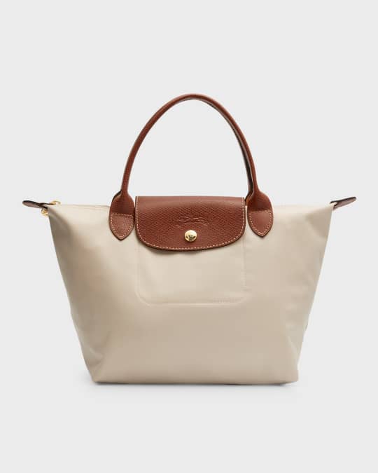 Comparison and What fits in the Longchamp Bucket bag and extra small Le  Pliage tote! 
