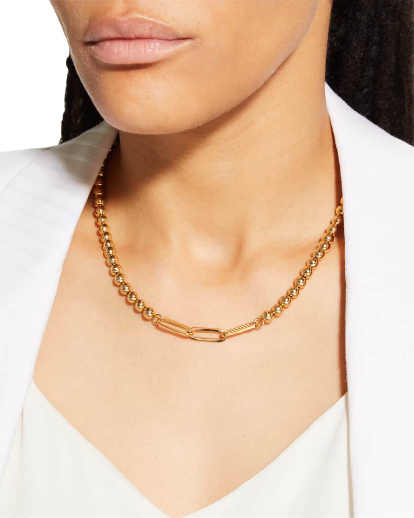 A small ball that sales can go on a necklace