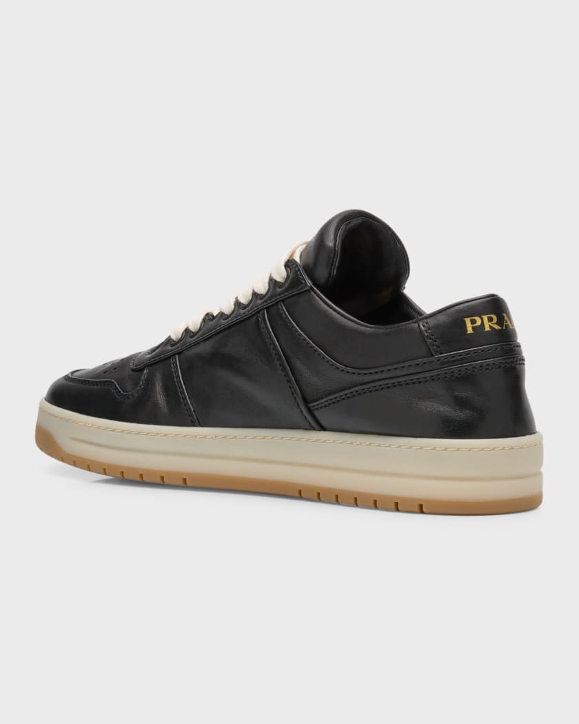 Logo leather low-top sneakers in black - Prada