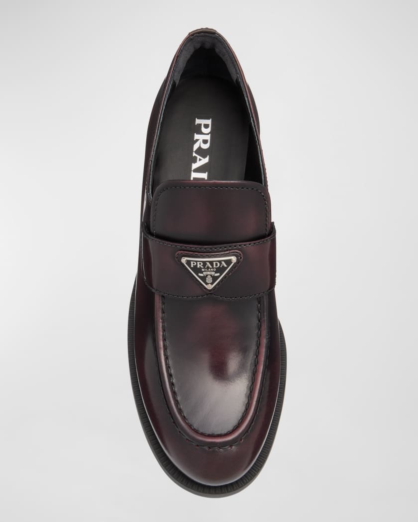 Prada logo-plaque leather loafers - Black
