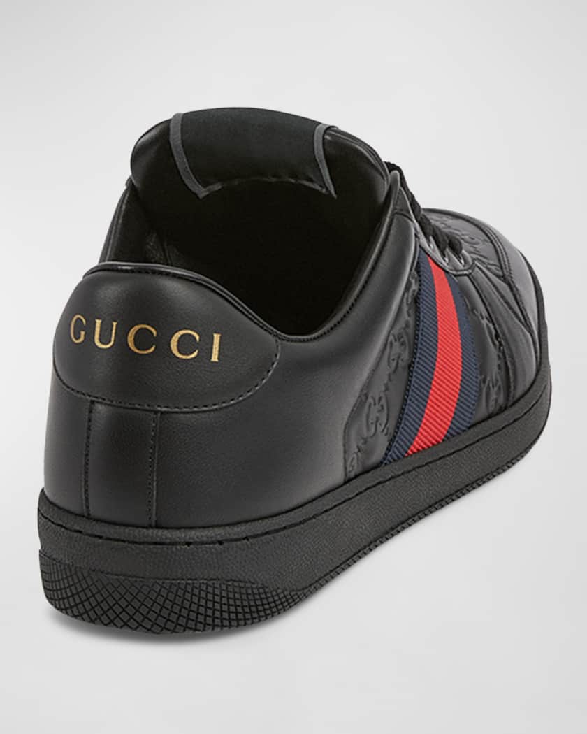 GG Embossed Leather Low-Top Sneakers