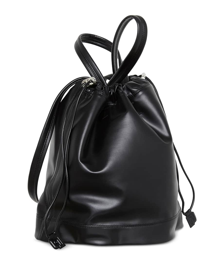 Medium Black and Gold Paco bucket bag in leather