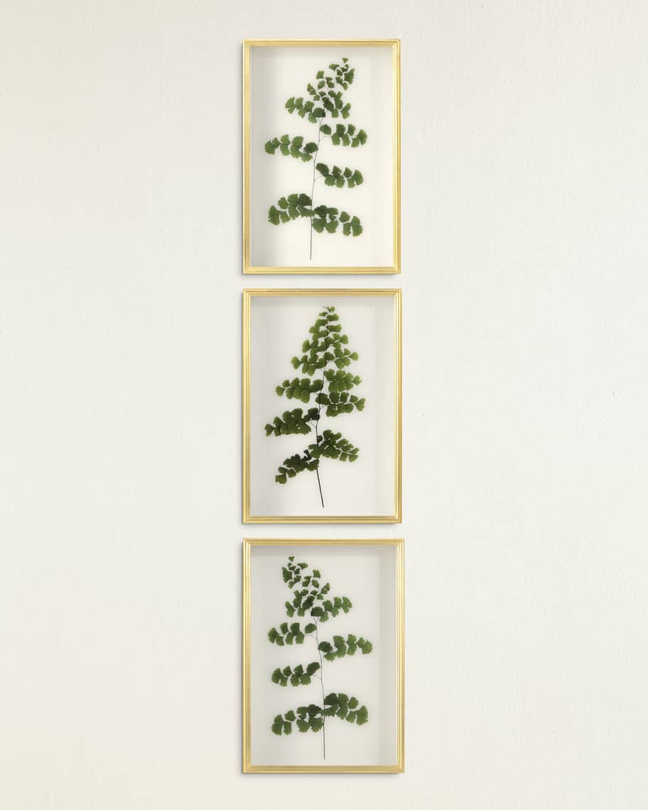 A beautifully styled interior of a Neiman Marcus store with designer clothing and accessories on display