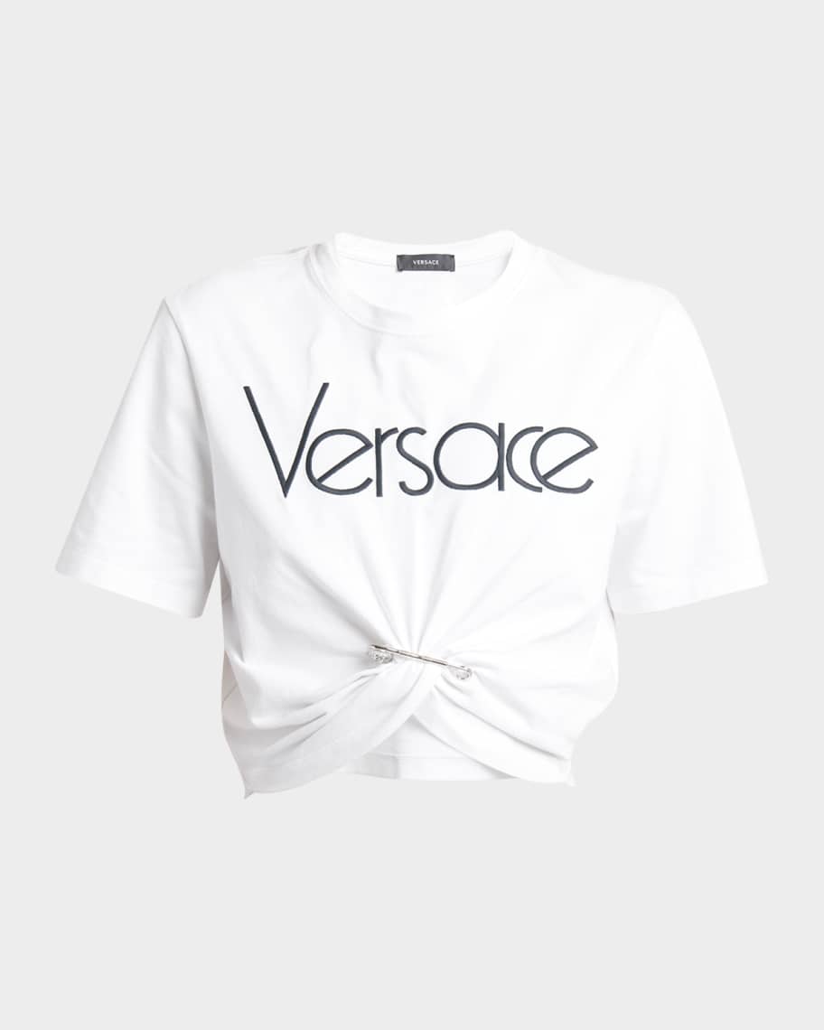Tシャツ・カットソー VERSACE SS25 \"SAFETY PIN\" CURLED TOP (1018081 1A124971B000) Black T-shirt with decorative safety pin and draping Versace
