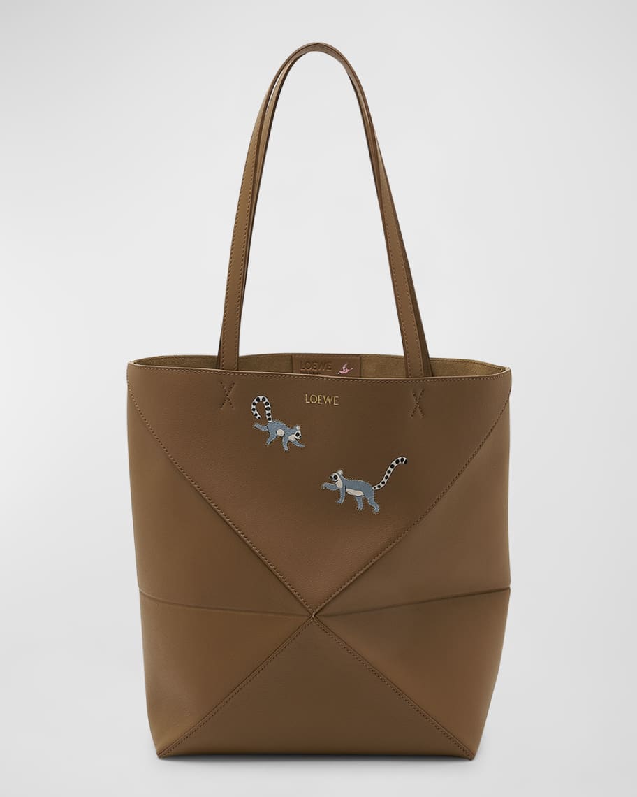 Image 1 of 6: Puzzle Fold Medium Tote Bag in Shiny Leather with Lemurs