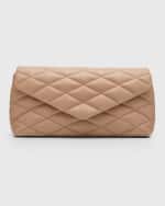 Image 1 of 6: Saint Laurent Sade Puffy Large YSL Clutch Bag in Quilted Smooth Leather