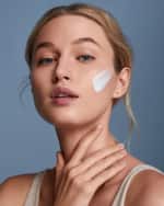 Image 4 of 5: Cle de Peau Beaute Protective Fortifying Emulsion SPF 22, 1.0 oz.