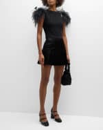 Image 5 of 6: Alice + Olivia Carter Shiny Vegan Leather Pleated Mini Skirt