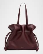 Image 1 of 6: Loewe Flamenco XL Clutch Bag in Napa Leather with Golden Foil Anagram