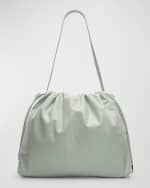 Image 1 of 6: THE ROW Angy Hobo Bag in Napa Leather