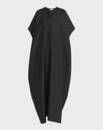 Image 1 of 6: THE ROW Saule Short-Sleeve Curved Shift Maxi Dress