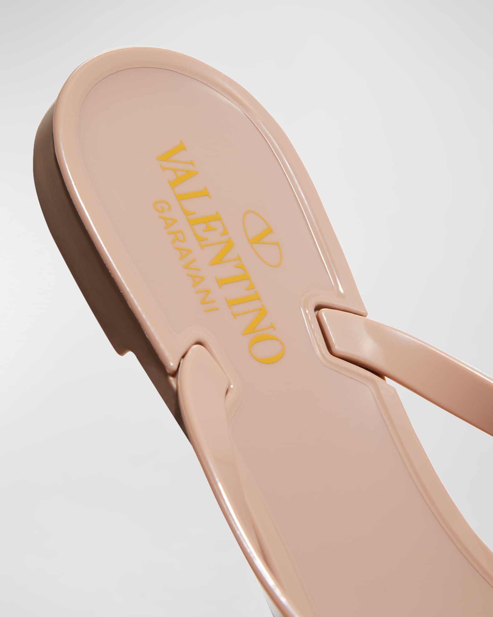 Valentino garavani rockstud pvc flat thong sandals online