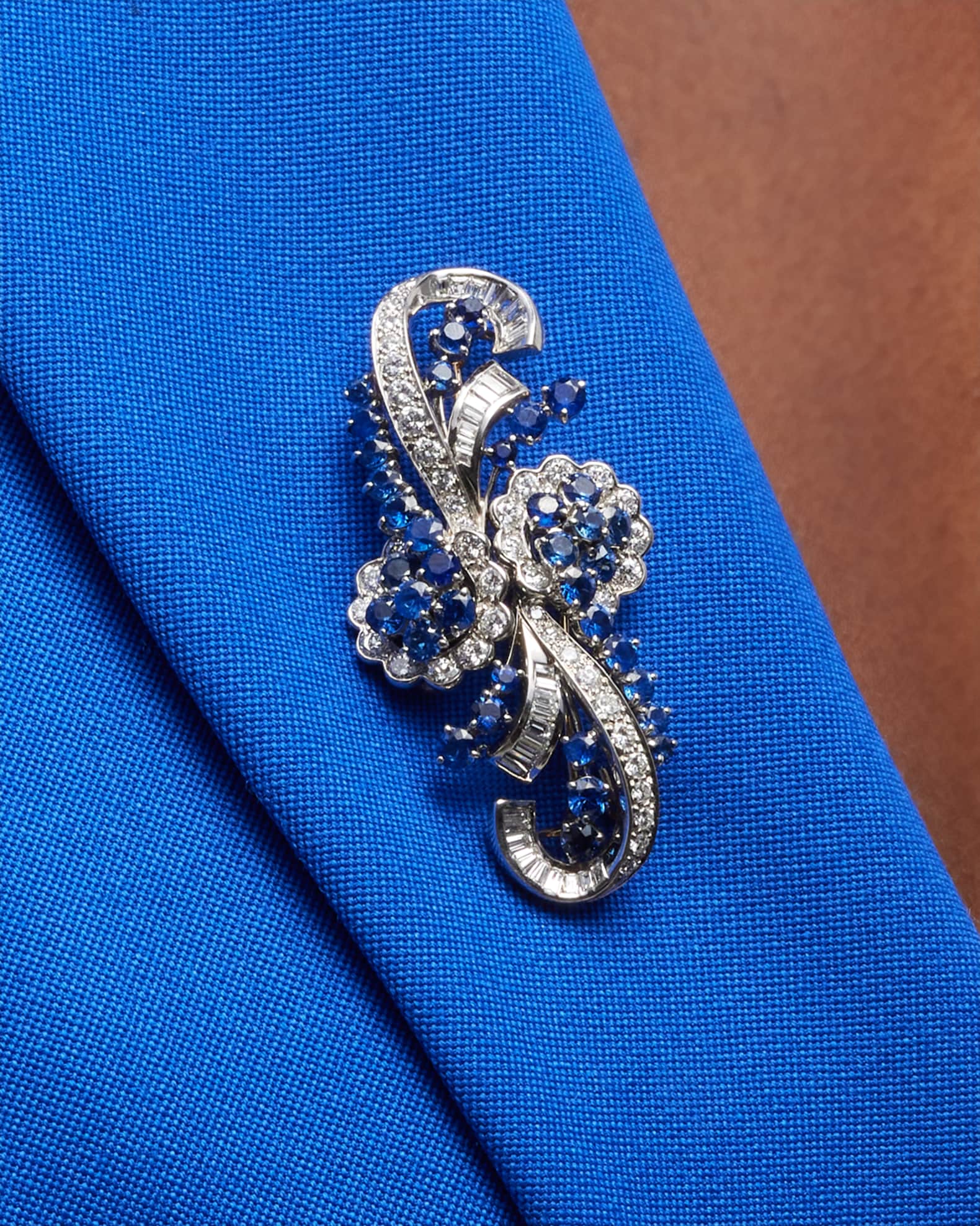 Estate Platinum Diamond and Blue Sapphire Cluster Retro Swirl Pin 1