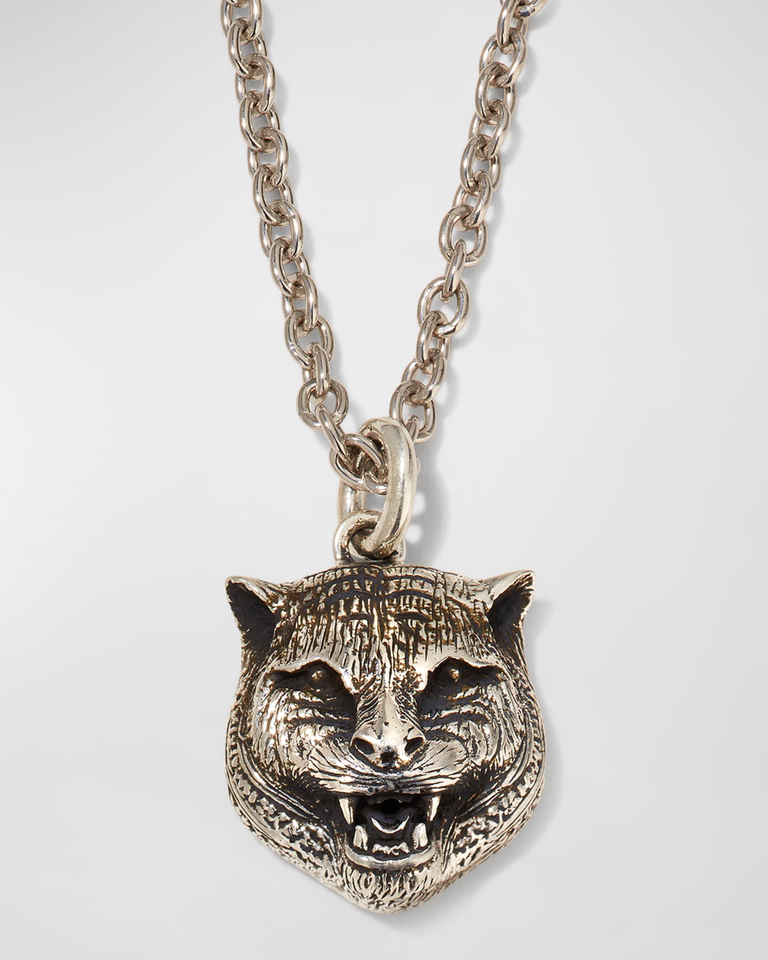 Gucci feline pendant best sale