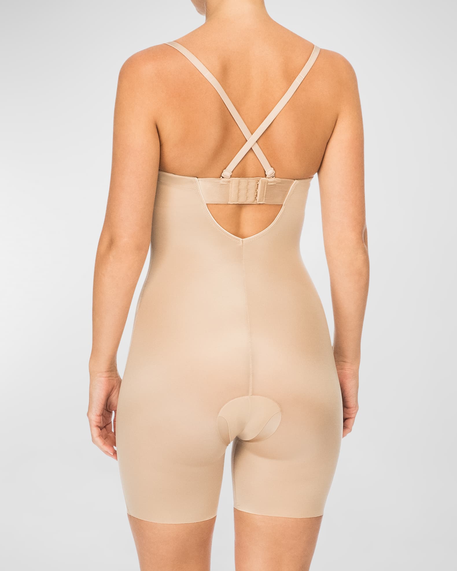 Suit Your Fancy Plunge Low-Back Mid-Thigh Bodysuit in Champagne Beige by  Spanx – My Bare Essentials