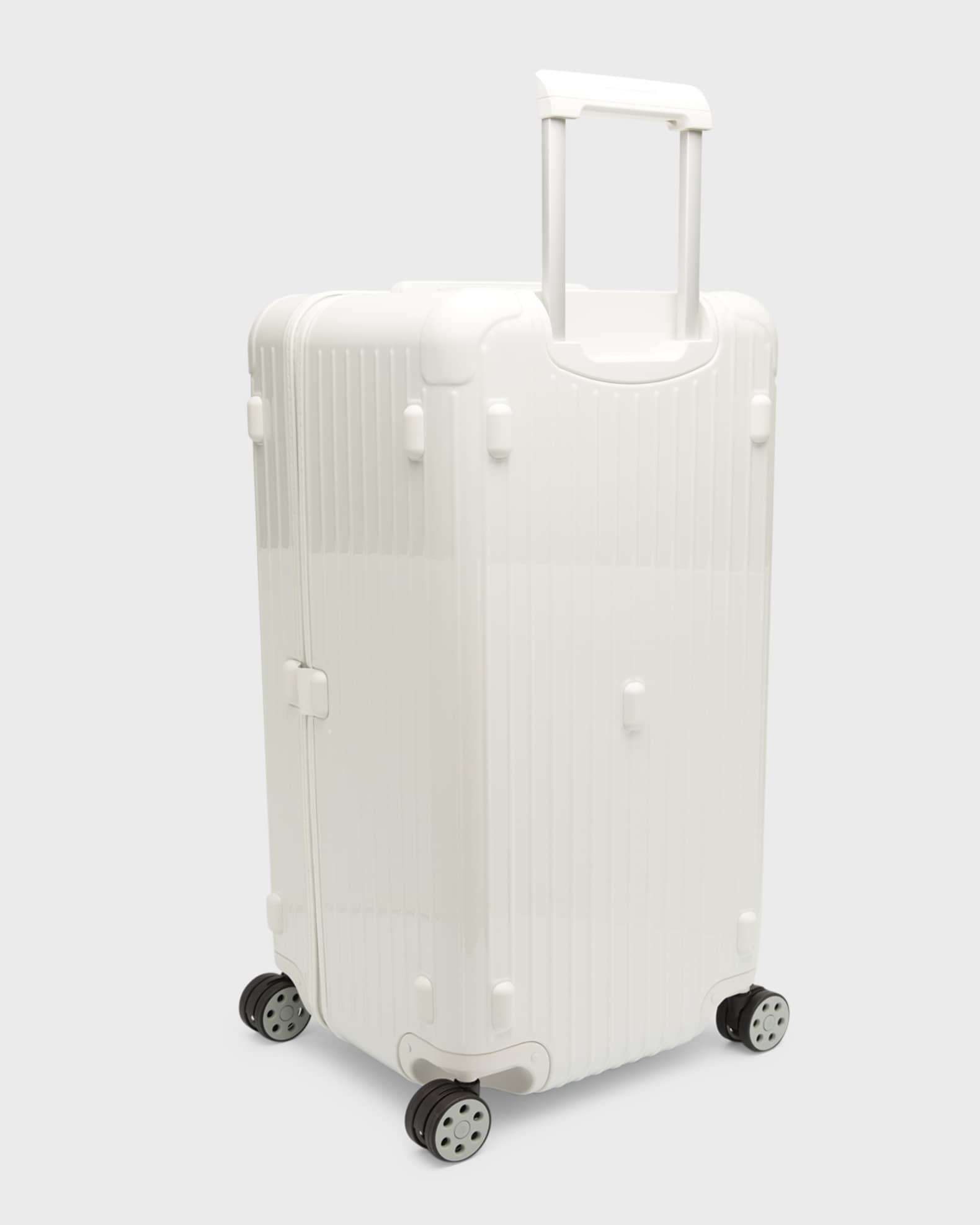 Neiman marcus top rimowa