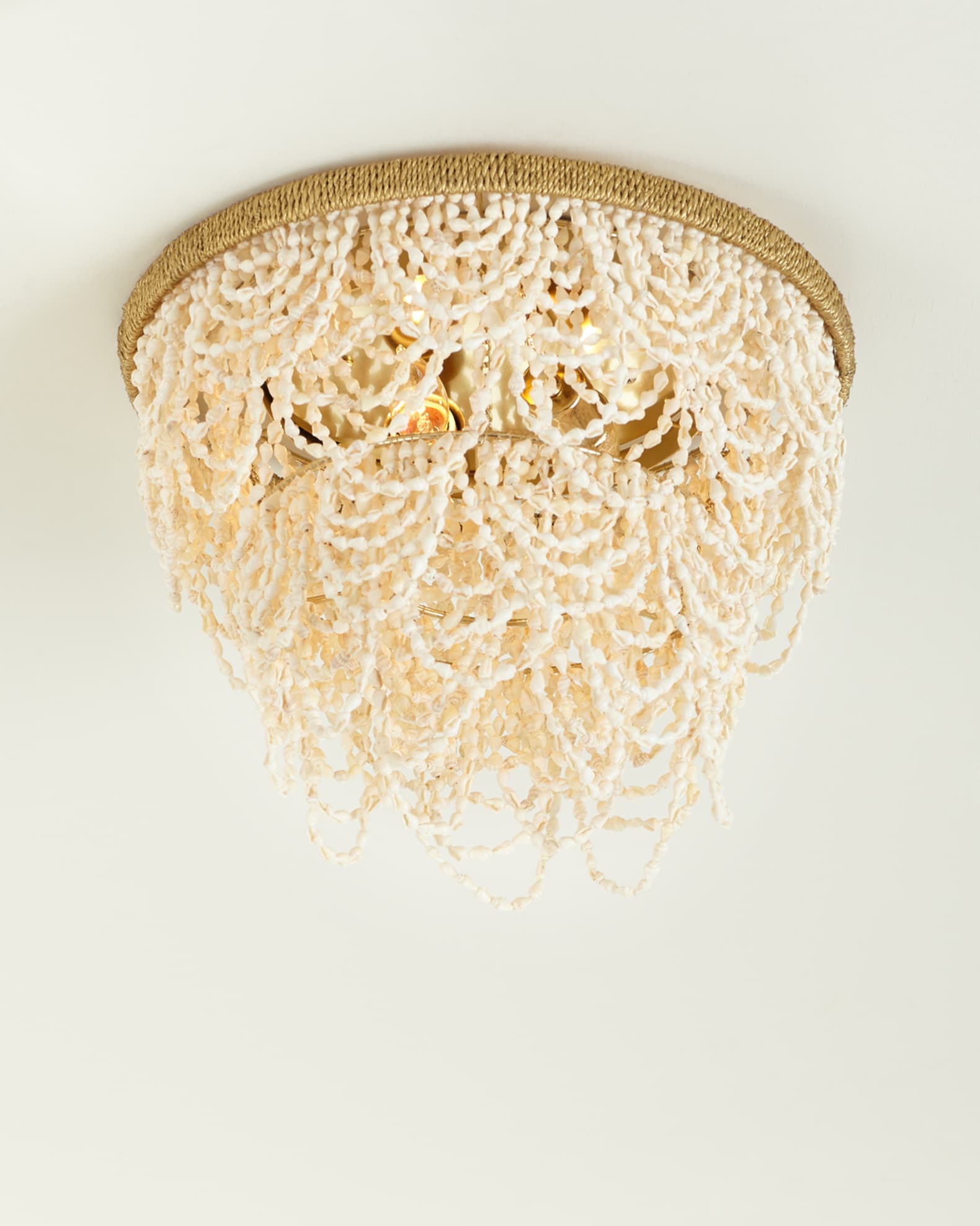 Shell flush mount light outlet