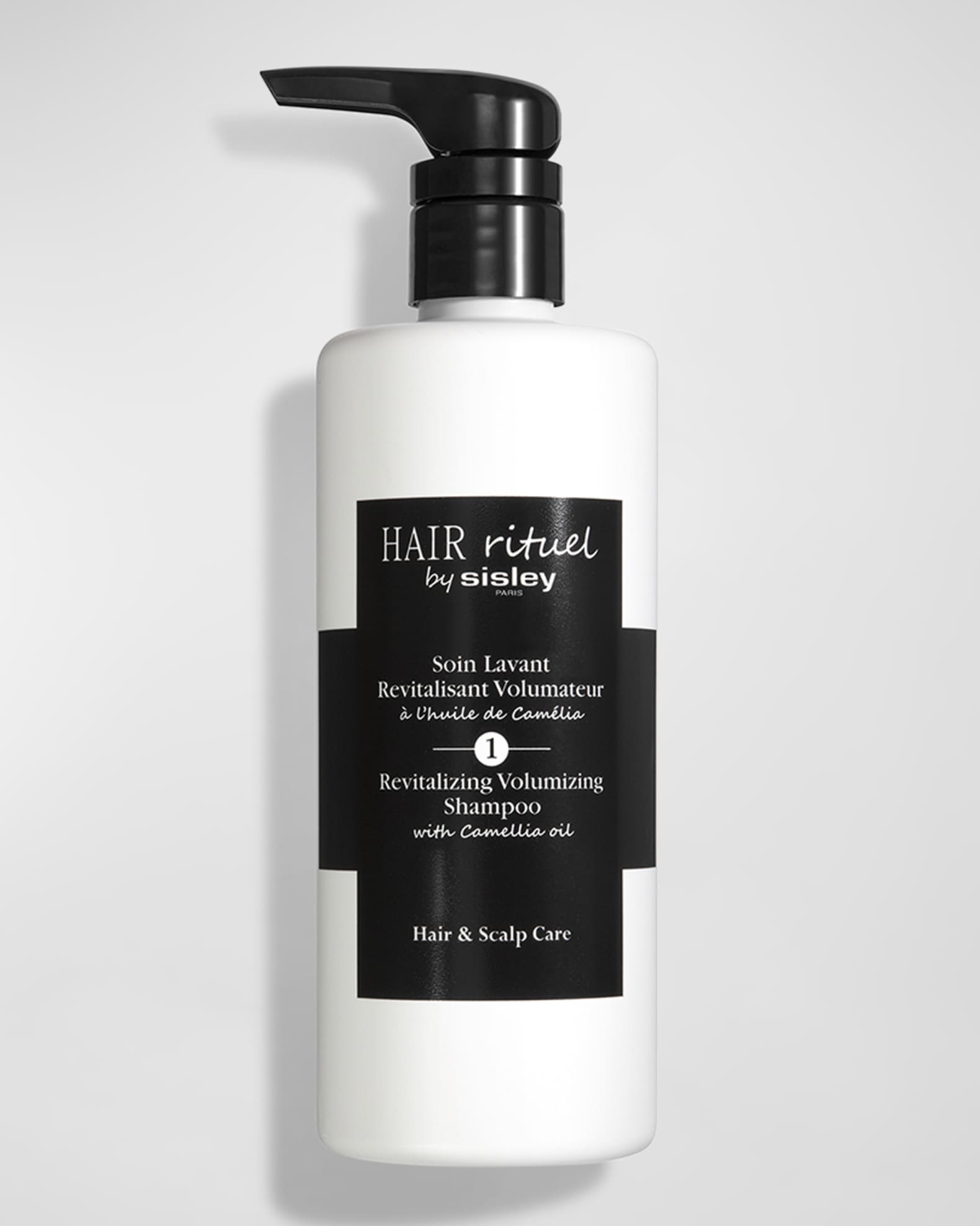 16.9 oz. Revitalizing Volumizing Shampoo with Camellia Oil 0