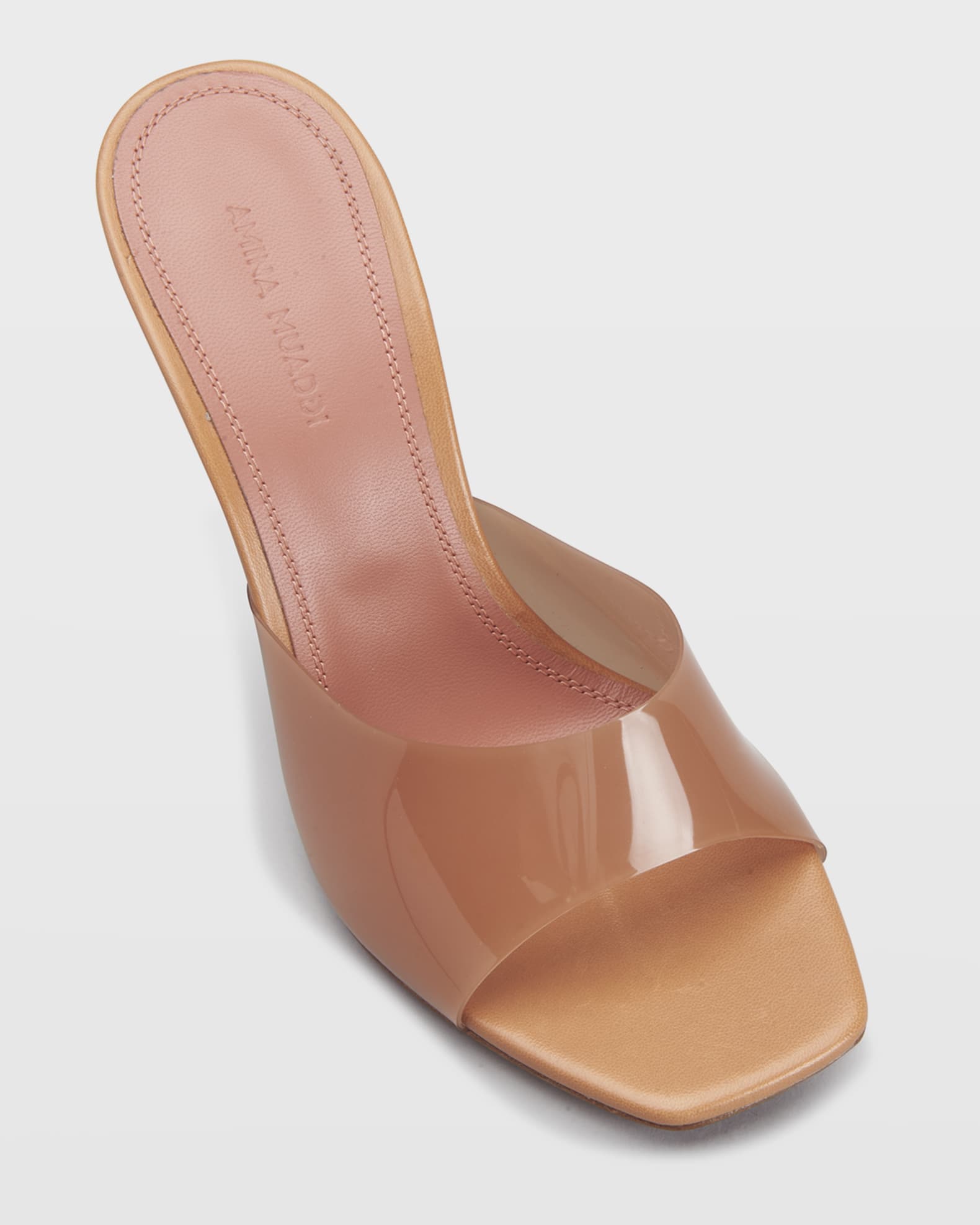 amina muaddi clear wedge
