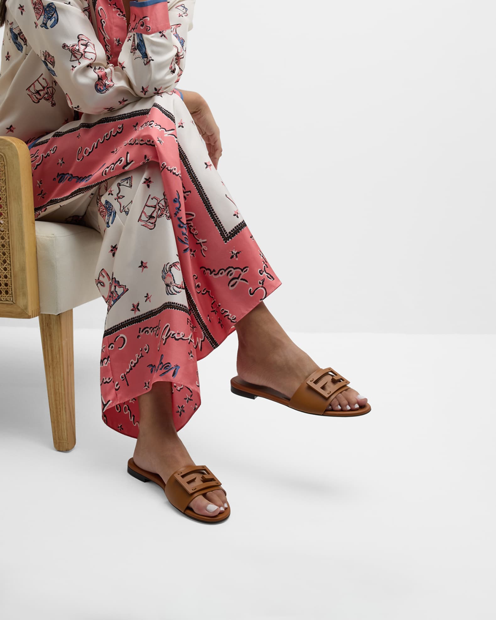 FF Tube Medallion Flat Sandals